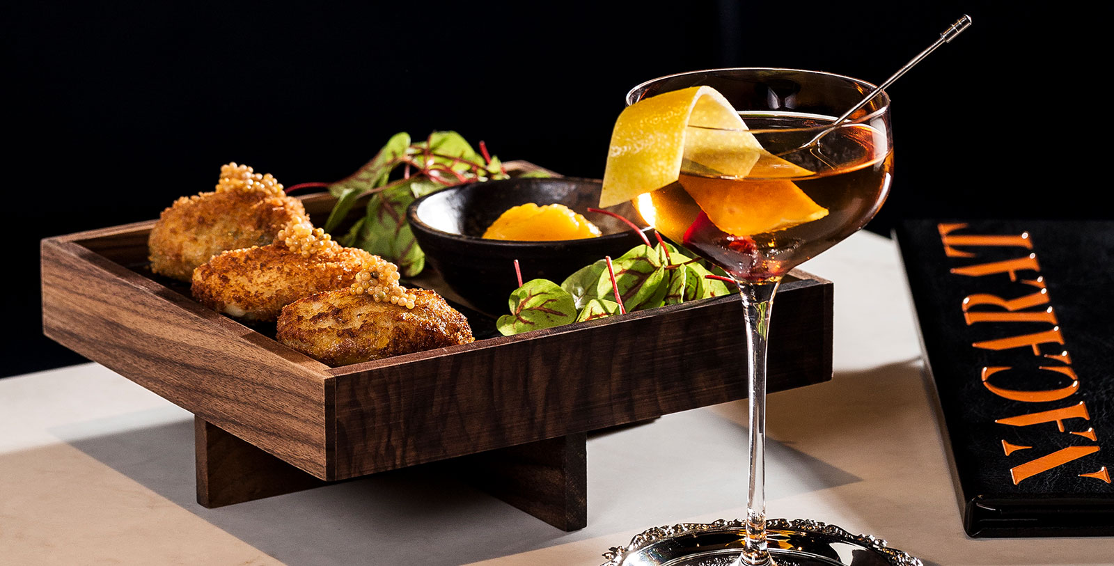 Taste the Montréal-style cuisine and sip some delicious cocktails at Bar Nacarat.