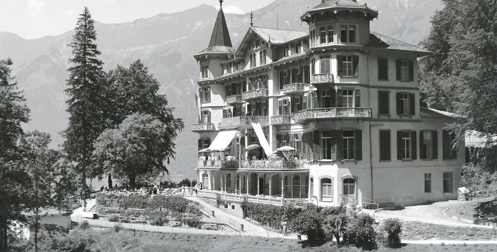 Historical Image of Exterior with Waterfall, Grandhotel Giessbach, 1822, Member of Historic Hotels Worldwide, in Interlaken-Brienz, Switzerland, History