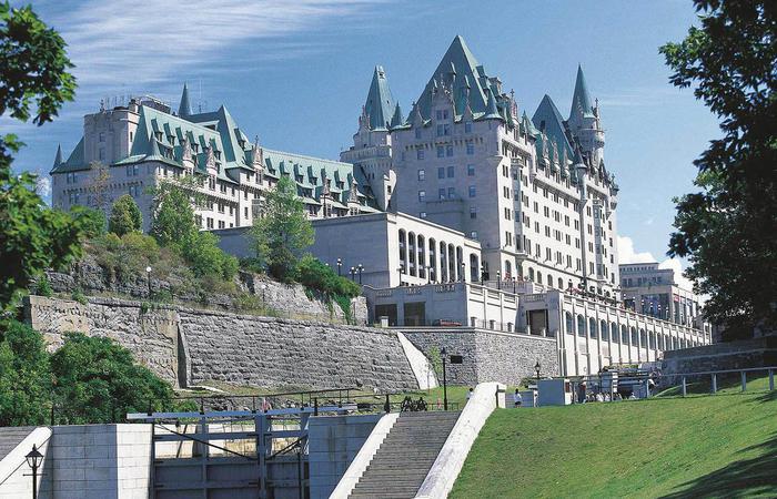 Daytime exterior of Fairmont Chateau Laurier in Ottowa, Ontario, Canada.