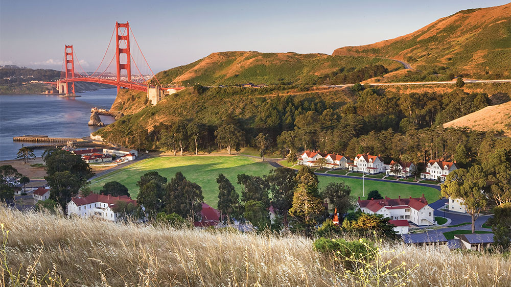 Daytime aerial view of Cavallo Point in San Francisco, California with Golden Gate Bridge in the back.